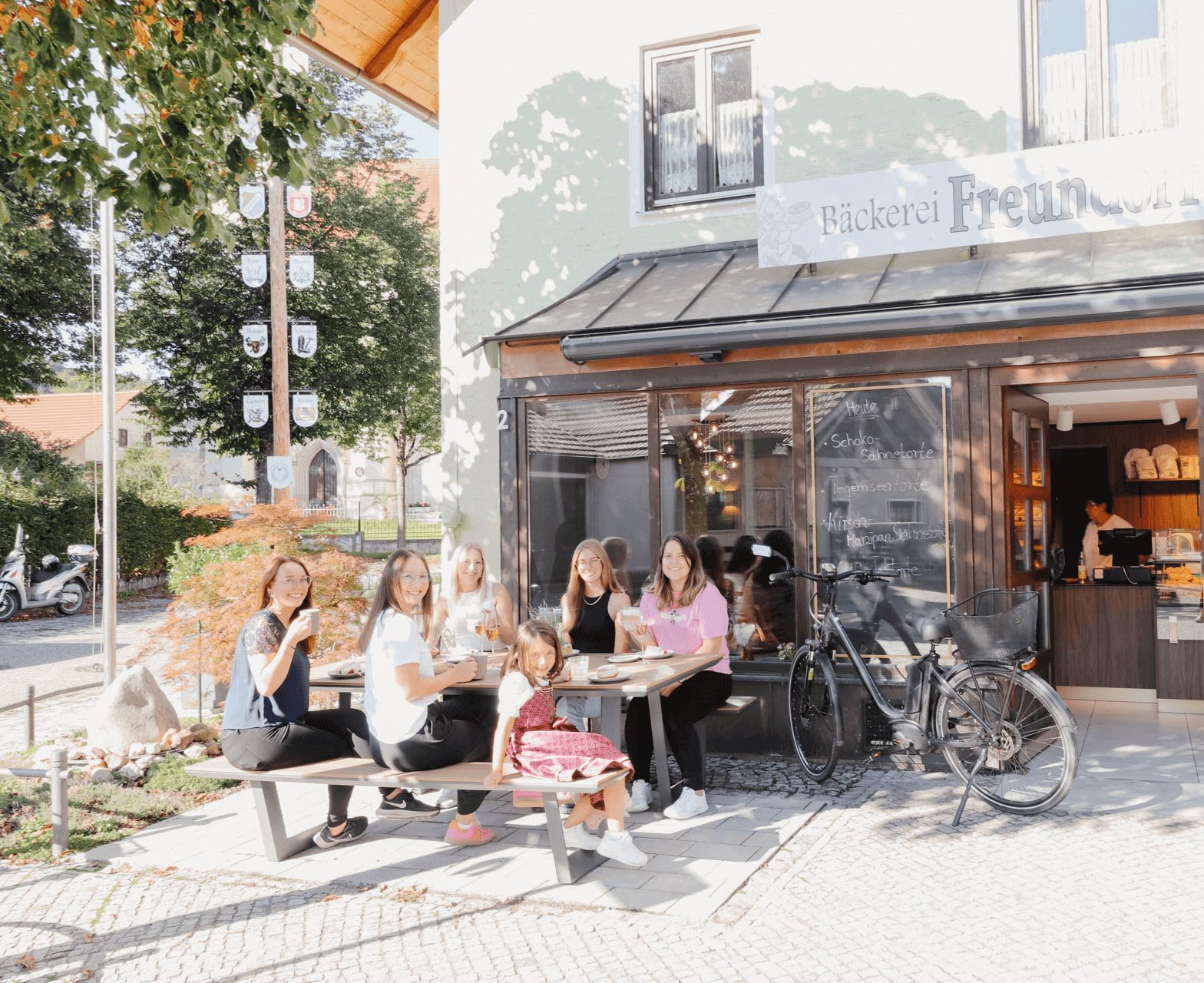 Familie vor der Bäckerei